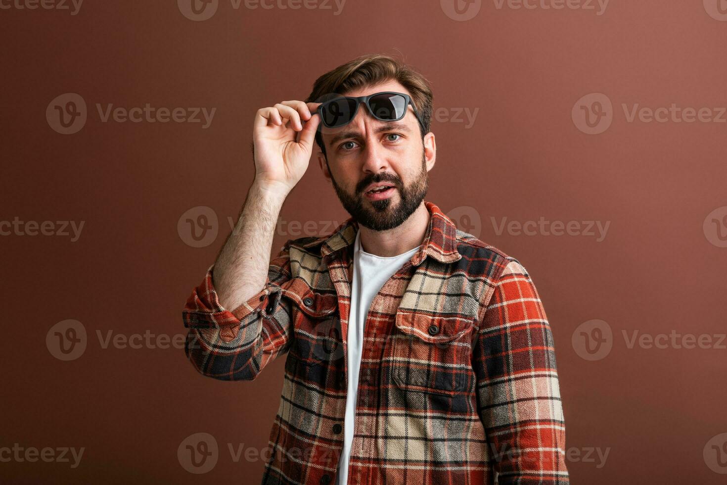 handsome man on brown background photo