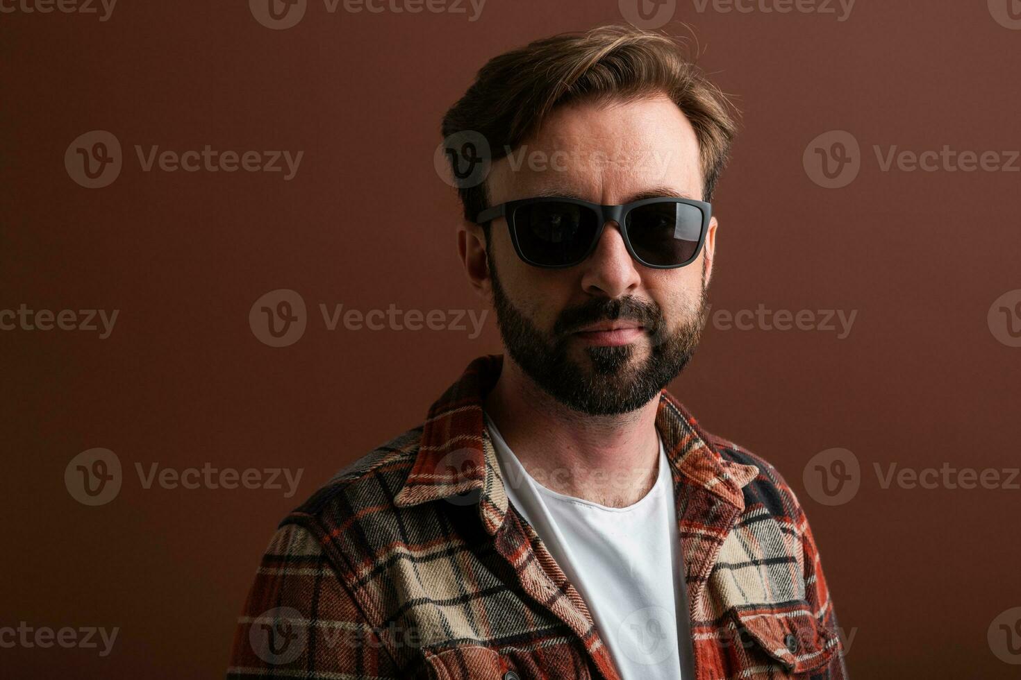 handsome man on brown background photo