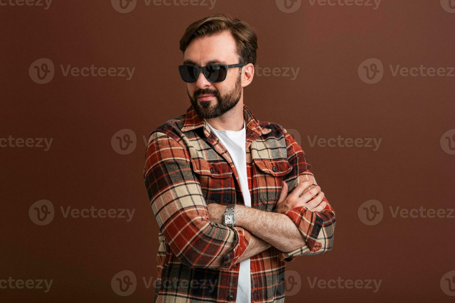 handsome man on brown background photo