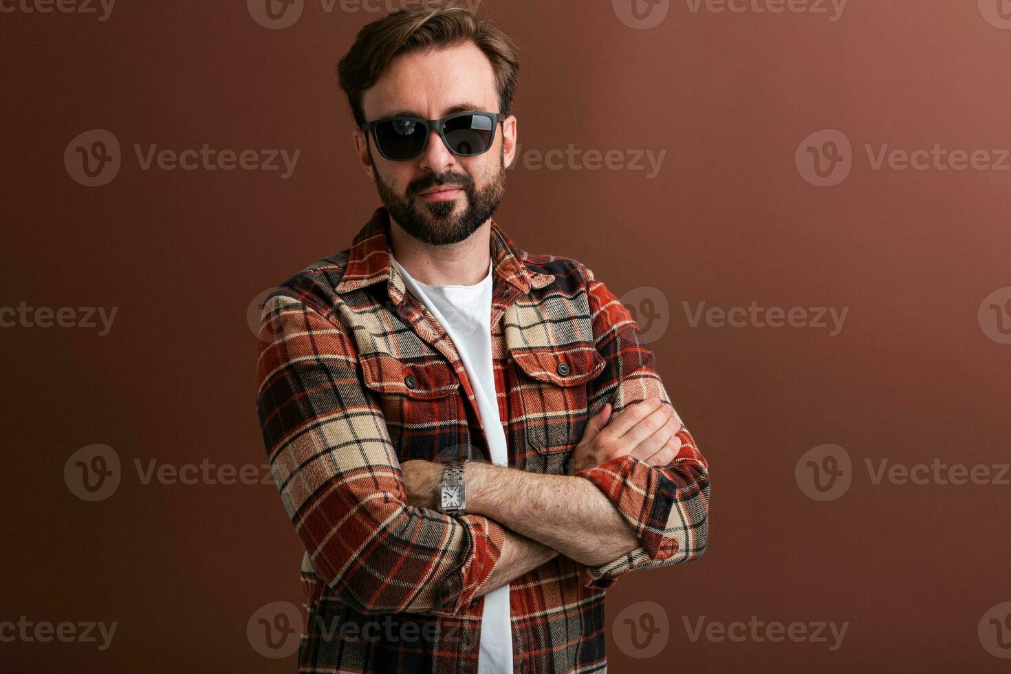 handsome man on brown background photo
