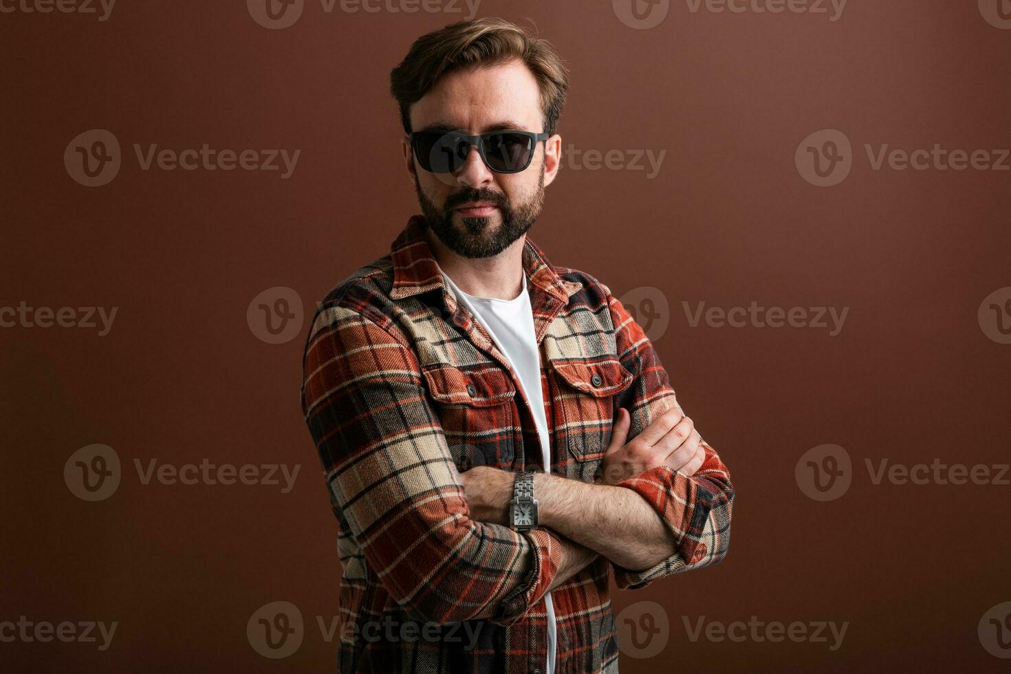 handsome man on brown background photo