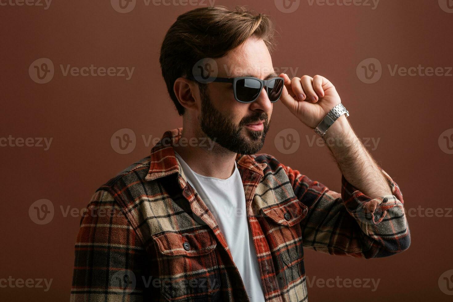 handsome man on brown background photo