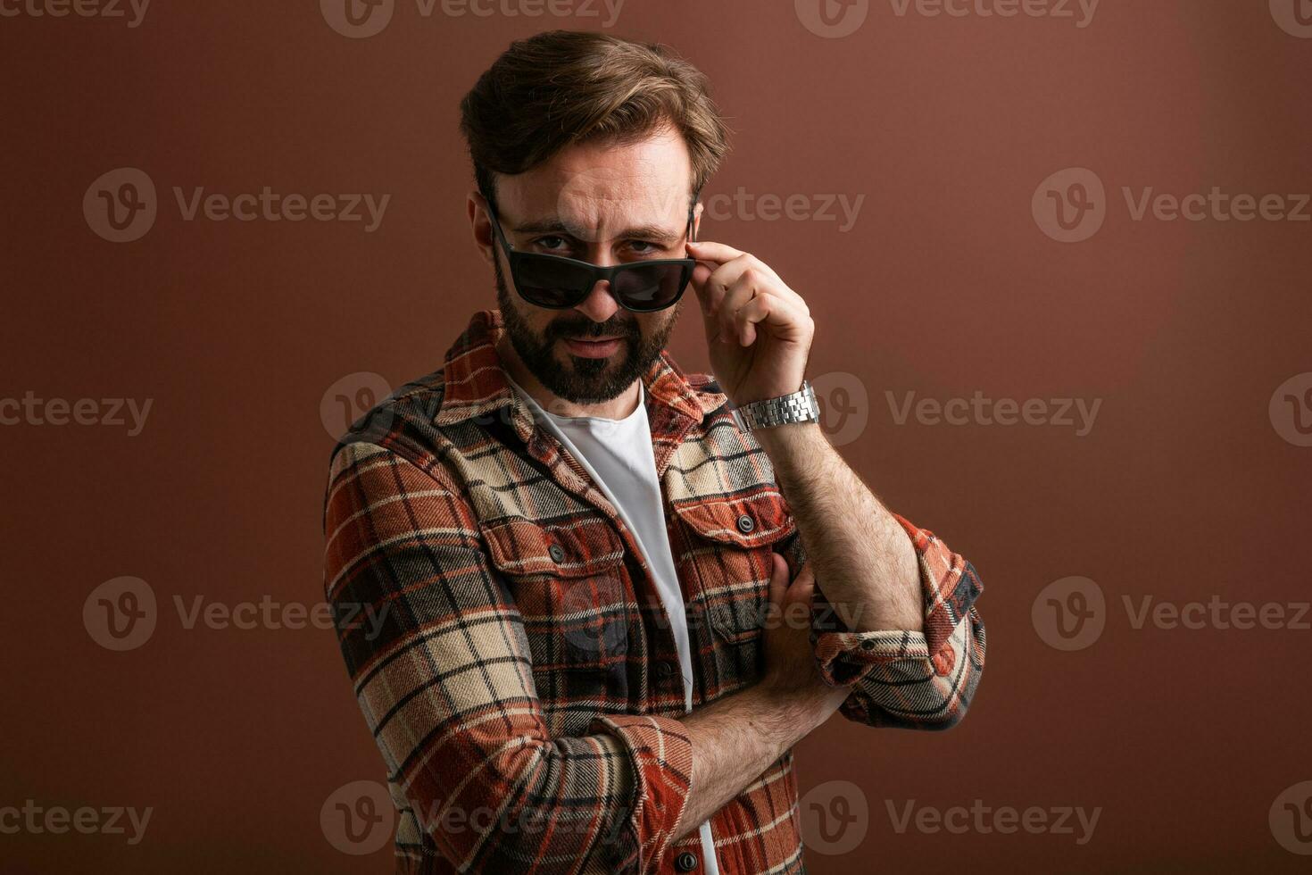 handsome man on brown background photo