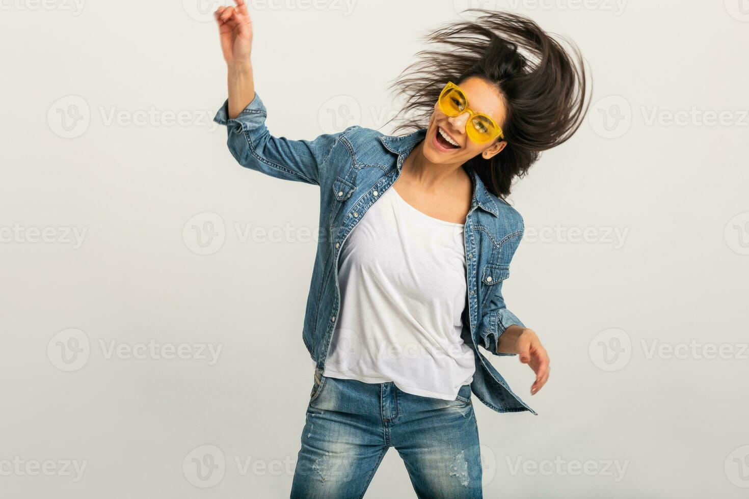 attractive smiling happy woman dancing waving long hair photo