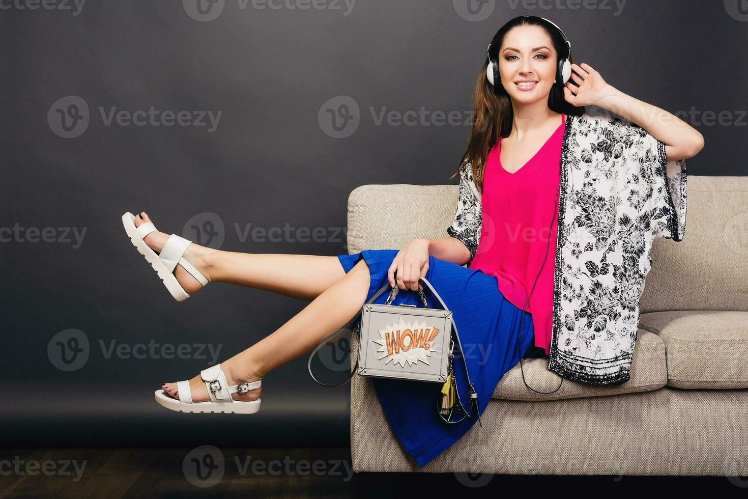 woman posing with stylish footwear summer fashion and bag photo