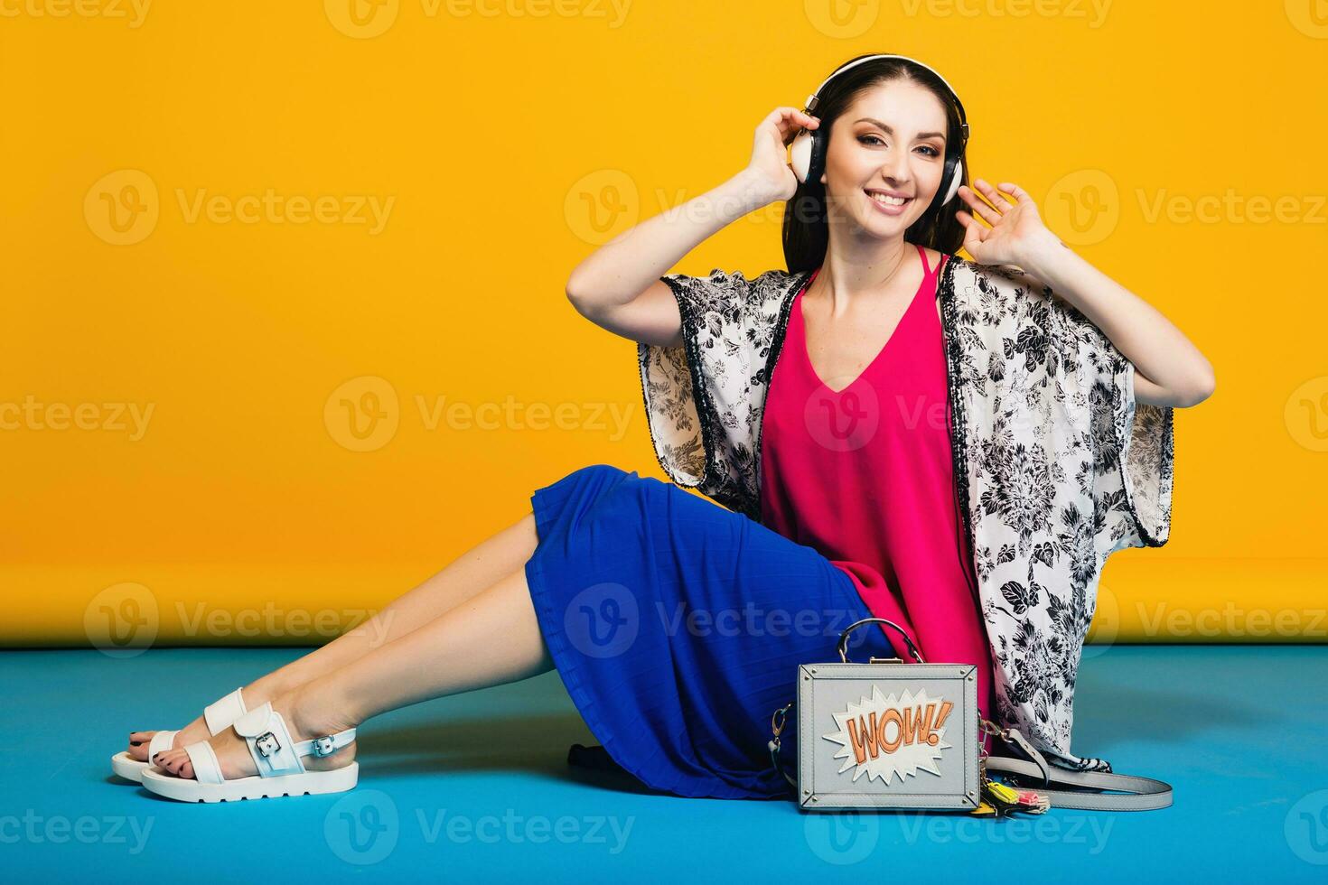 woman posing with stylish footwear summer fashion and bag photo