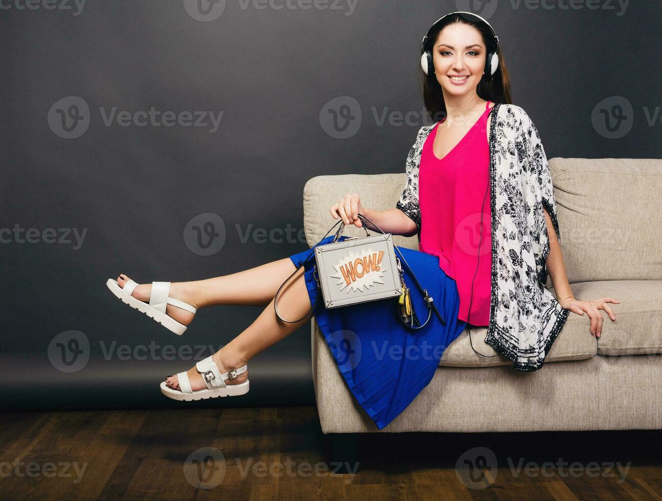 woman posing with stylish footwear summer fashion and bag photo