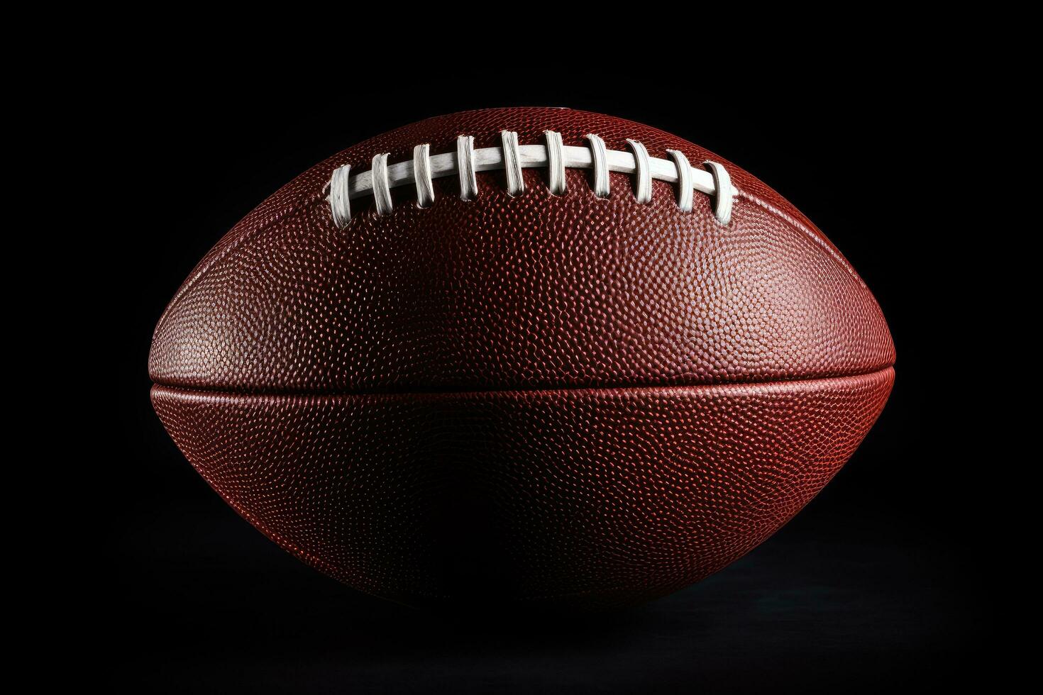 American football ball isolated on black background. Close-up image. American football ball close up on black background, AI Generated photo
