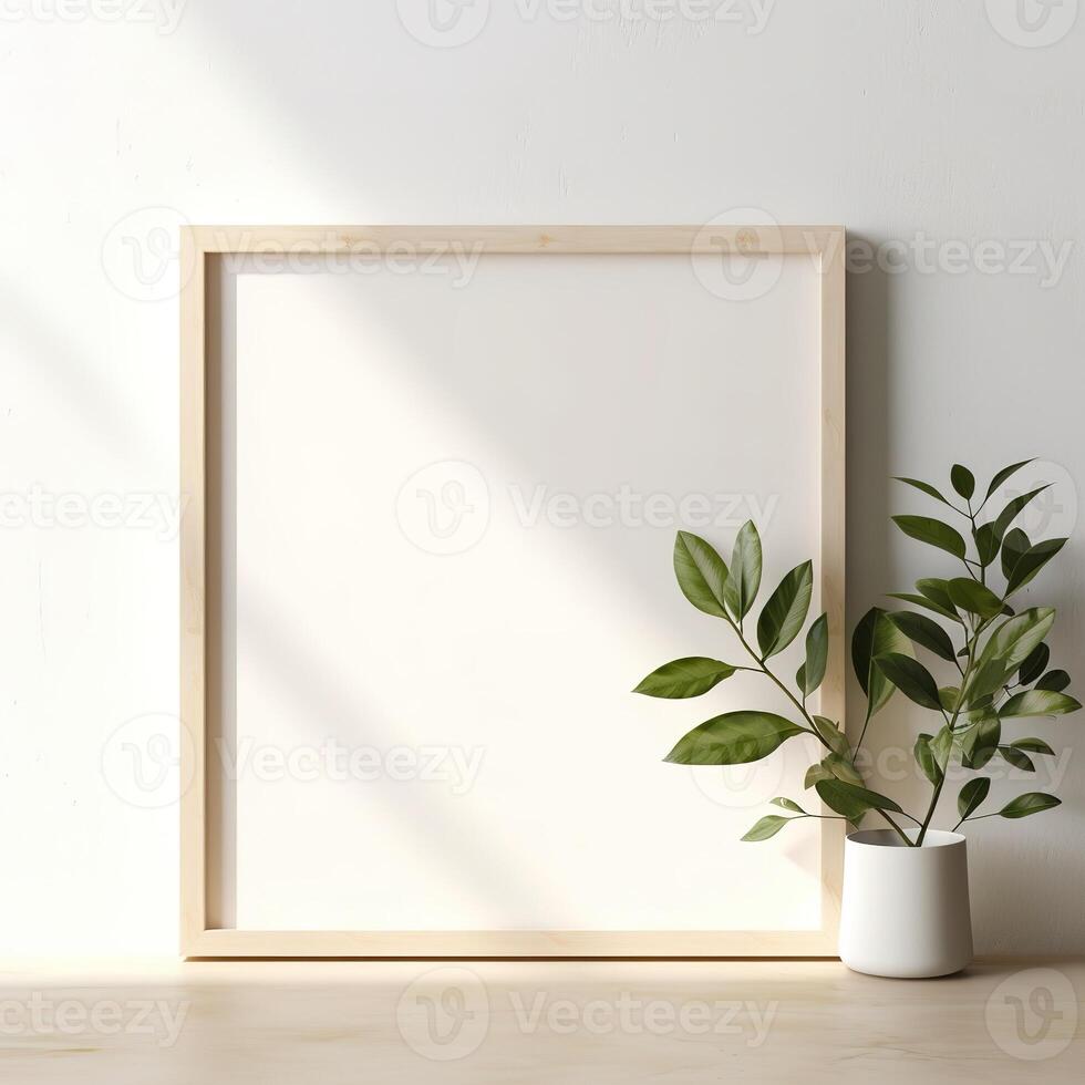 a white frame with a green plant photo
