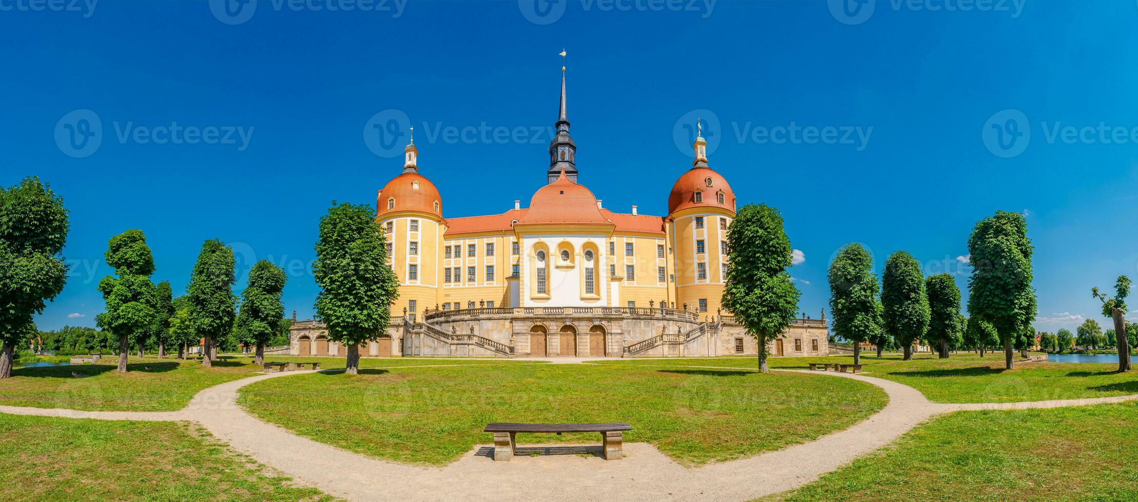 Moritzburg, Saxony, Germany - JPanoramic over famous ancient Moritzburg Castle, near Dresden at sunny summer day with blue sky photo