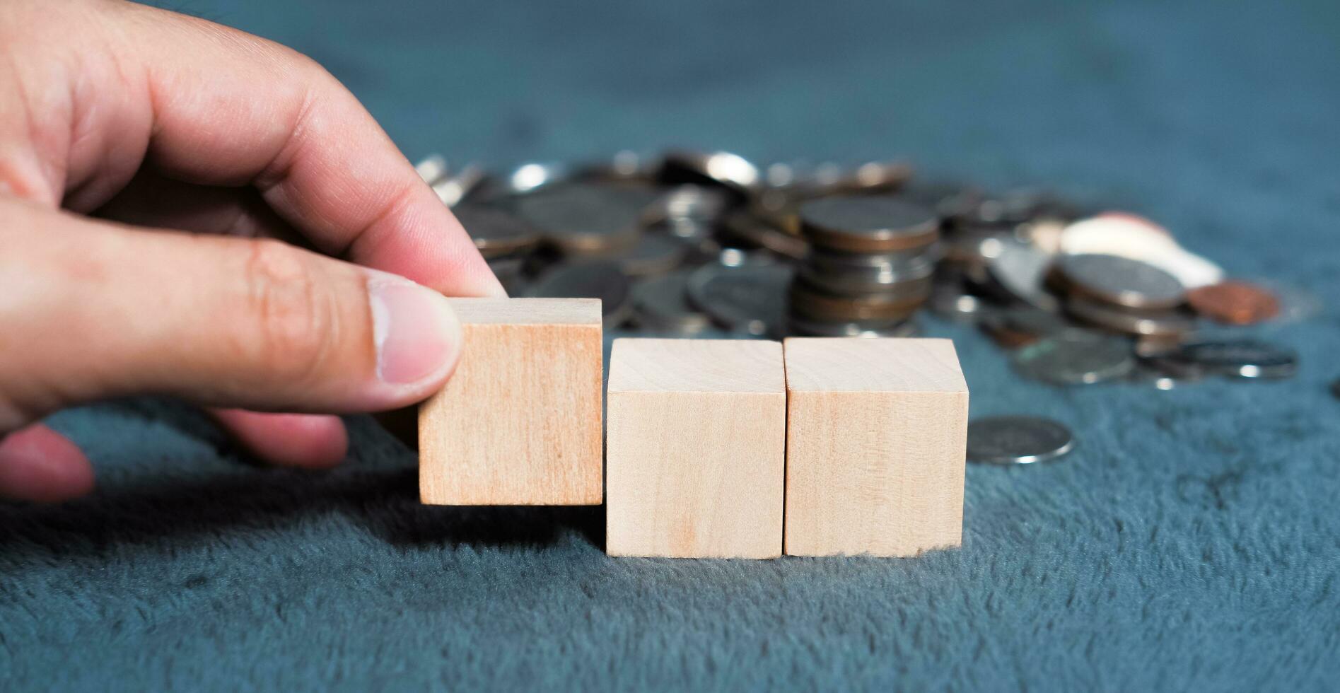 Wooden dice, money coins, money saving ideas Suitable for making infographics. photo