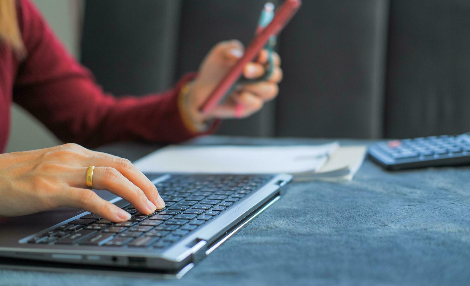 Woman typing work or chatting on laptop Suitable for making infographics. photo