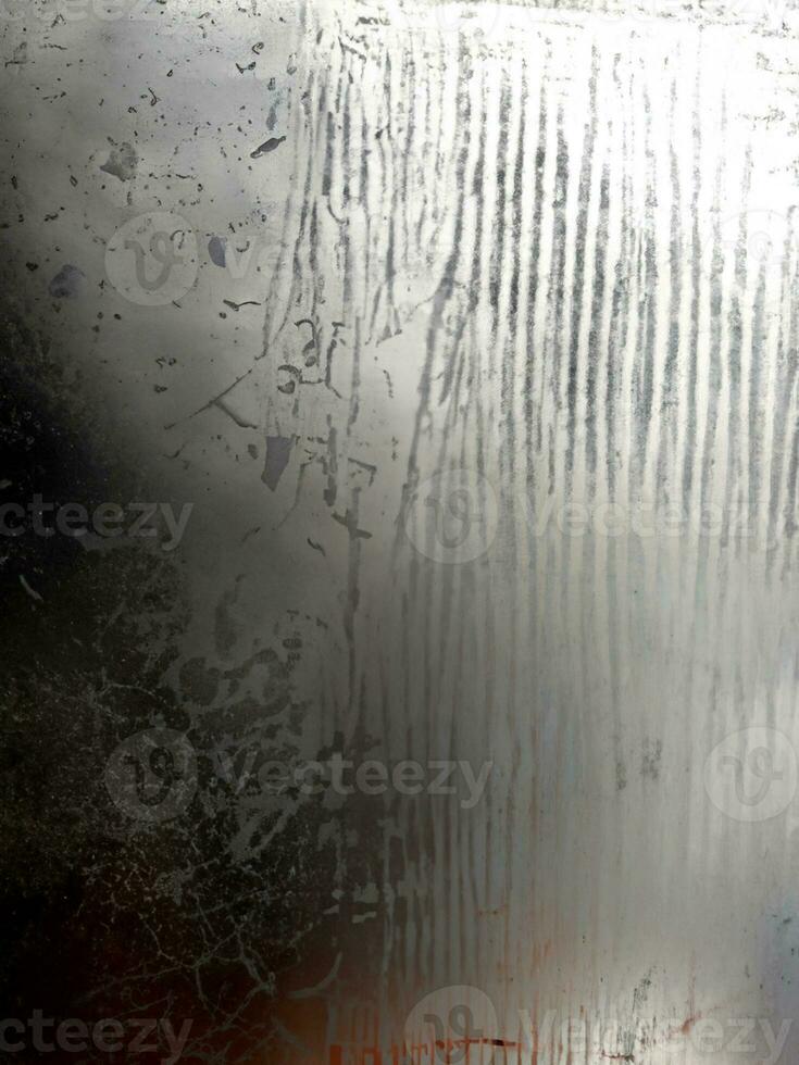 Metal texture with dust scratches and cracks. photo