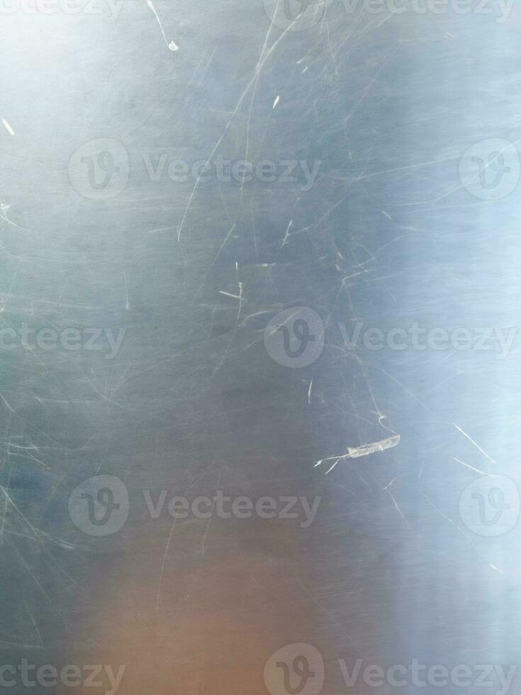 Metal texture with dust scratches and cracks. photo