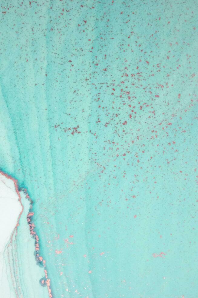 Artistic background that applicable for design cover, poster, brochure. Modern art. Marble texture. Natural pattern. Ink colors are amazingly bright. Alcohol ink sea texture. Contemporary art. photo