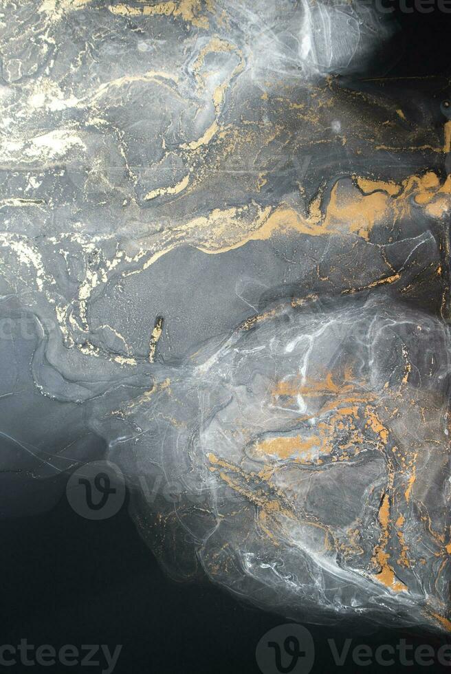 Ink colors are amazingly bright, luminous, translucent, free-flowing, and dry quickly. Abstract artwork. Trendy wallpaper. Natural pattern, luxury. Art for your design project. Transparent creativity. photo