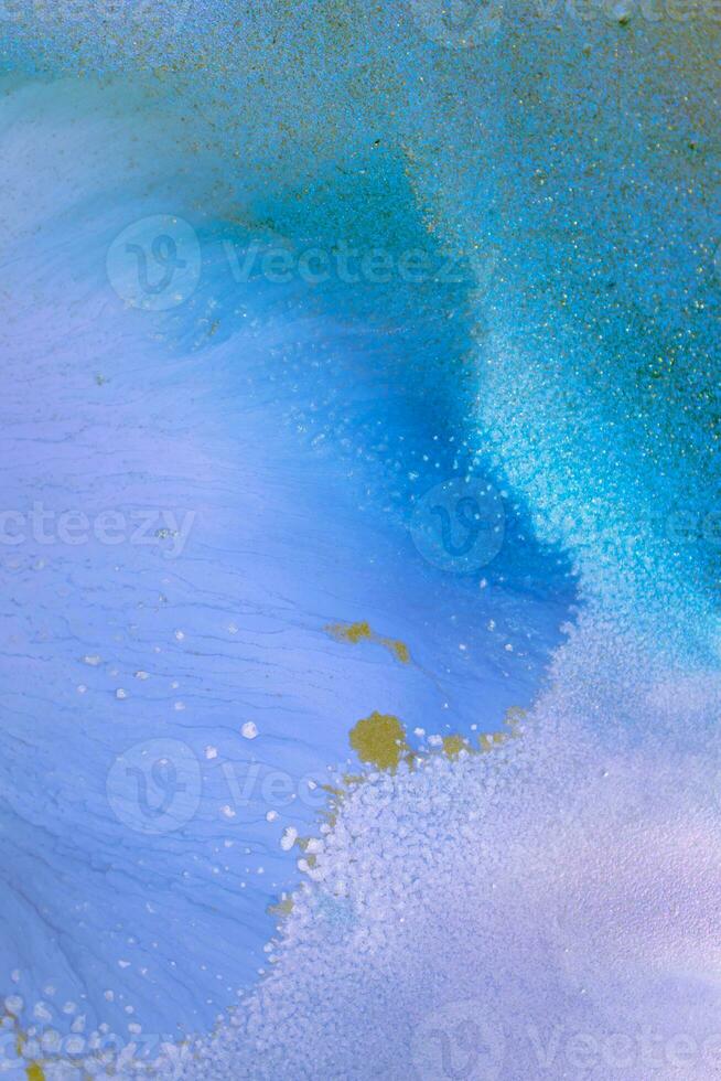 The picture is painted in alcohol ink. Creative abstract artwork made with translucent ink colors. Trendy wallpaper. Abstract painting, can be used as a background for wallpapers, posters, websites. photo