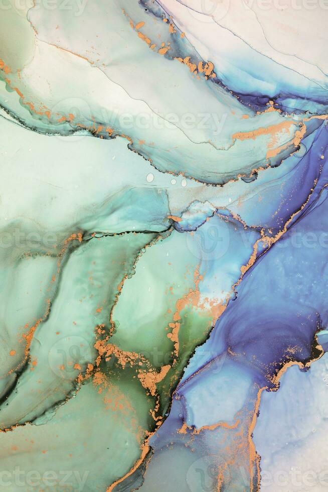 Painting created with alcohol ink. Soft smooth color transitions combined with clear gold and silver edges. Blue, pink, green abstract color combination. photo