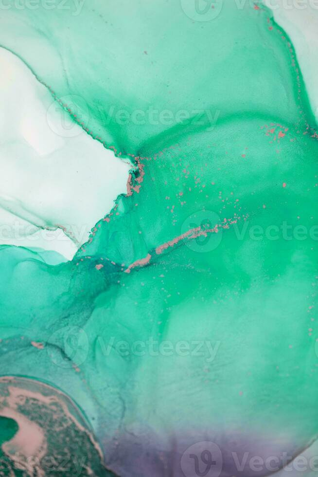 Painting created with alcohol ink. Soft smooth color transitions combined with clear gold and silver edges. Blue, pink, green abstract color combination. photo