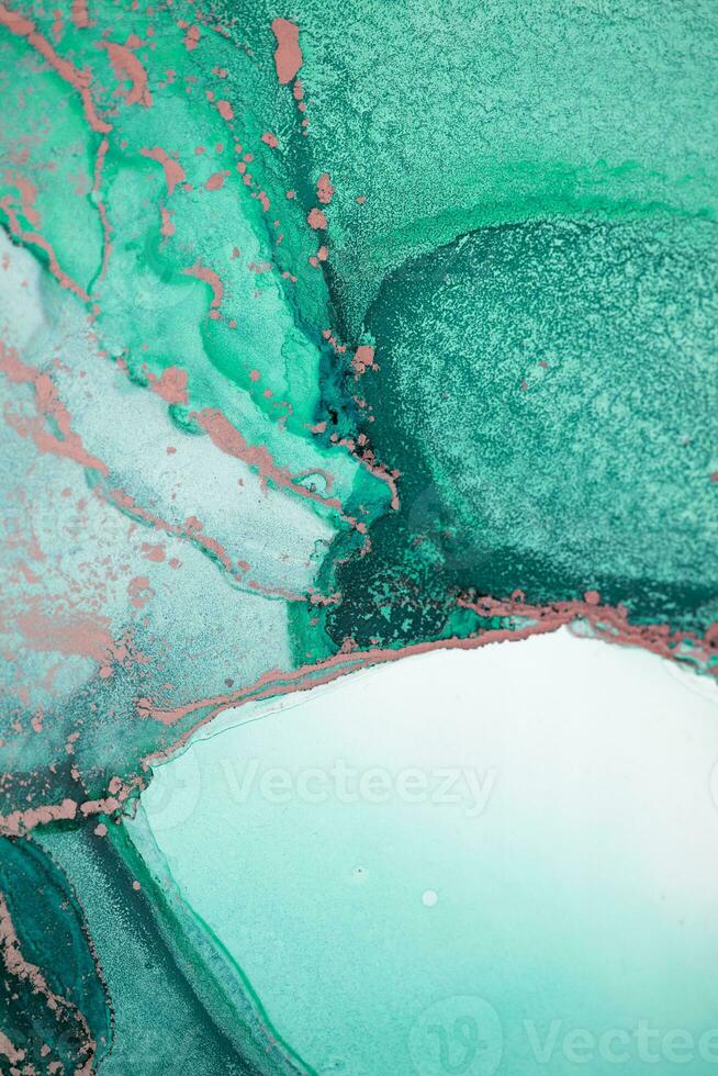 Painting created with alcohol ink. Soft smooth color transitions combined with clear gold and silver edges. Blue, pink, green abstract color combination. photo