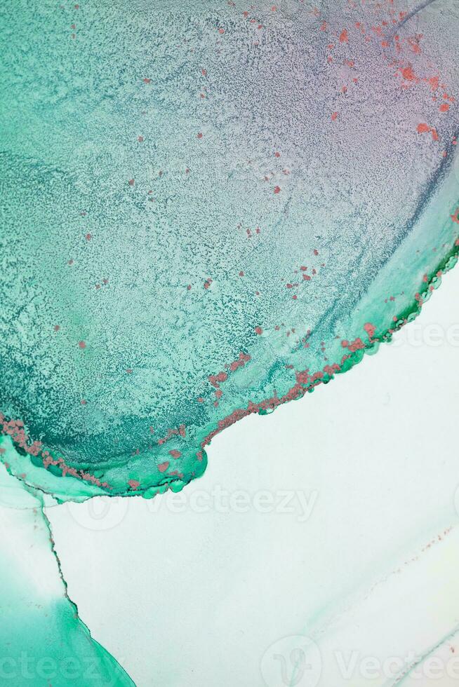 Painting created with alcohol ink. Soft smooth color transitions combined with clear gold and silver edges. Blue, pink, green abstract color combination. photo