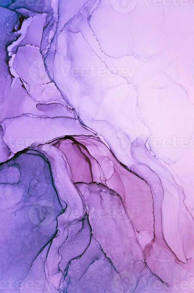 Abstract created using the technique of Alcohol ink. Macro photography of the smallest details of a panting. The panting shows how overflows of shades and colors of paint resemble space motifs. photo