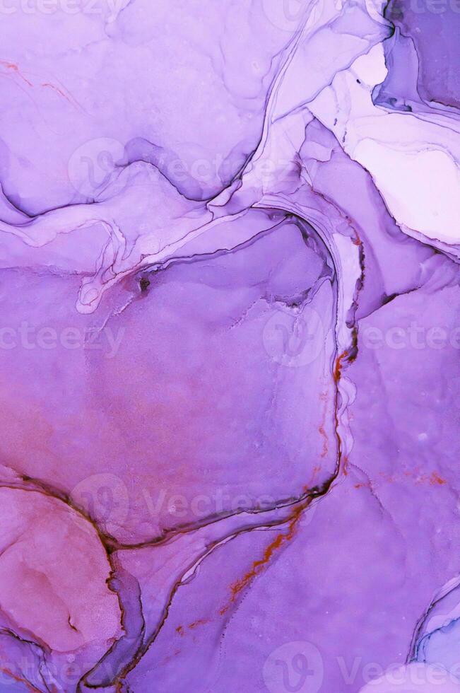 Abstract created using the technique of Alcohol ink. Macro photography of the smallest details of a panting. The panting shows how overflows of shades and colors of paint resemble space motifs. photo