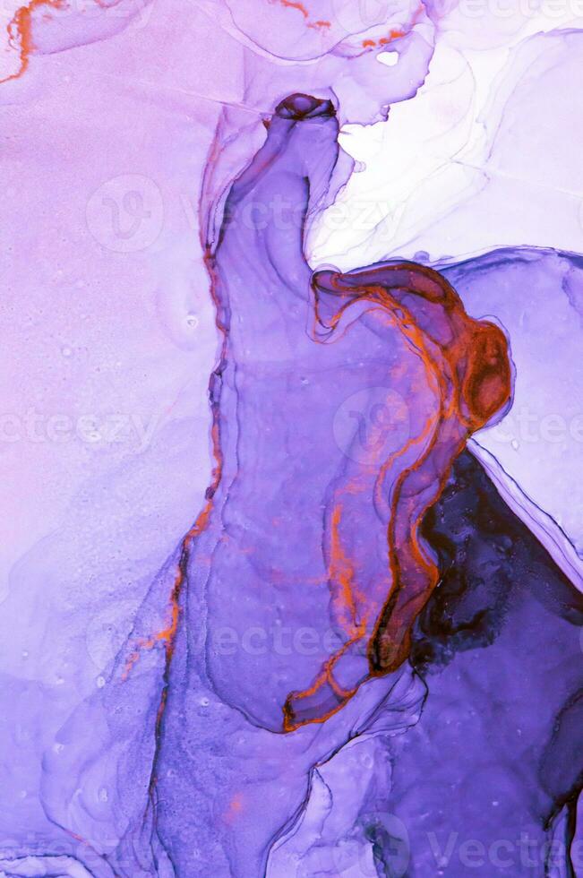 Abstract created using the technique of Alcohol ink. Macro photography of the smallest details of a panting. The panting shows how overflows of shades and colors of paint resemble space motifs. photo