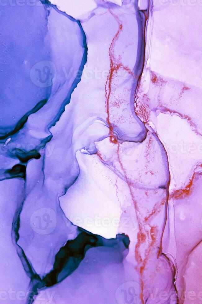 Abstract created using the technique of Alcohol ink. Macro photography of the smallest details of a panting. The panting shows how overflows of shades and colors of paint resemble space motifs. photo