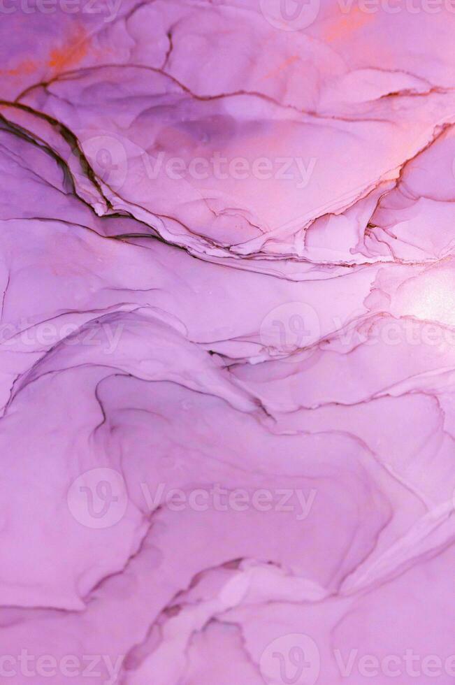 Abstract created using the technique of Alcohol ink. Macro photography of the smallest details of a panting. The panting shows how overflows of shades and colors of paint resemble space motifs. photo