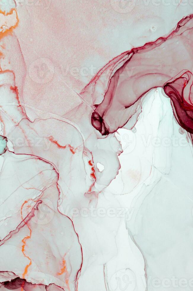 Abstract created using the technique of Alcohol ink. Macro photography of the smallest details of a panting. The panting shows how overflows of shades and colors of paint resemble space motifs. photo