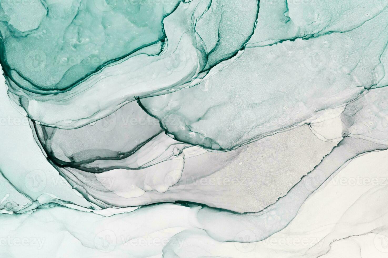 Abstract created using the technique of Alcohol ink. Macro photography of the smallest details of a panting. The panting shows how overflows of shades and colors of paint resemble space motifs. photo