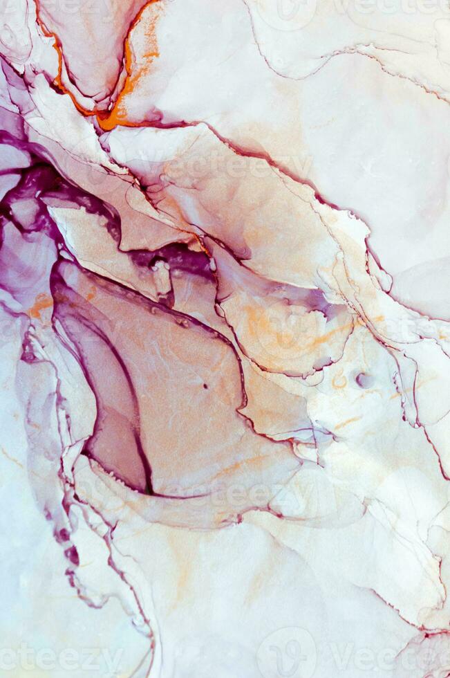 Abstract created using the technique of Alcohol ink. Macro photography of the smallest details of a panting. The panting shows how overflows of shades and colors of paint resemble space motifs. photo