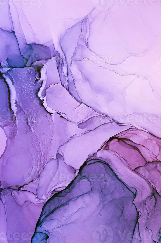 Abstract created using the technique of Alcohol ink. Macro photography of the smallest details of a panting. The panting shows how overflows of shades and colors of paint resemble space motifs. photo