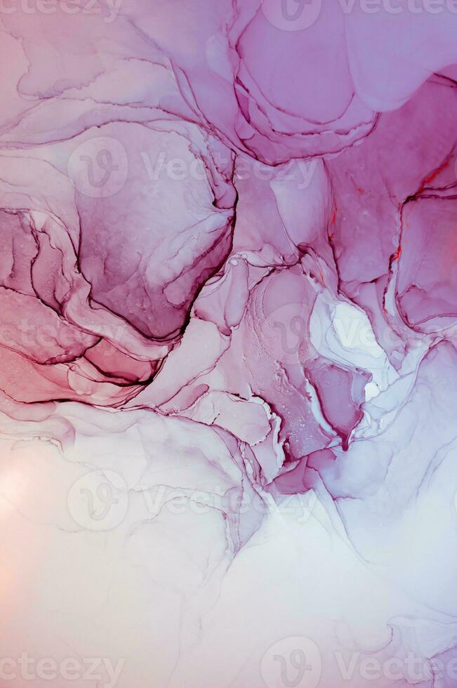 Abstract created using the technique of Alcohol ink. Macro photography of the smallest details of a panting. The panting shows how overflows of shades and colors of paint resemble space motifs. photo