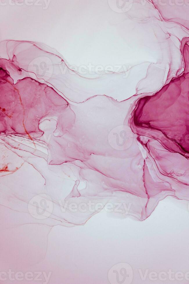 Abstract created using the technique of Alcohol ink. Macro photography of the smallest details of a panting. The panting shows how overflows of shades and colors of paint resemble space motifs. photo