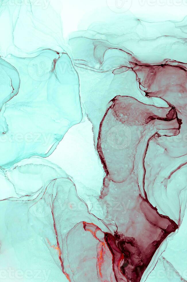 Abstract created using the technique of Alcohol ink. Macro photography of the smallest details of a panting. The panting shows how overflows of shades and colors of paint resemble space motifs. photo