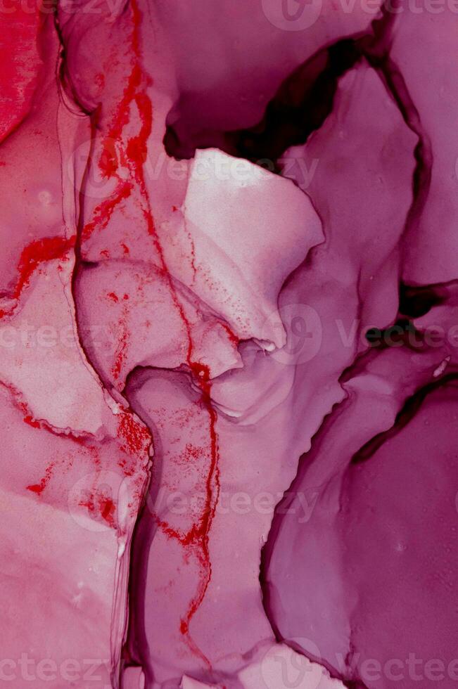 Abstract created using the technique of Alcohol ink. Macro photography of the smallest details of a panting. The panting shows how overflows of shades and colors of paint resemble space motifs. photo