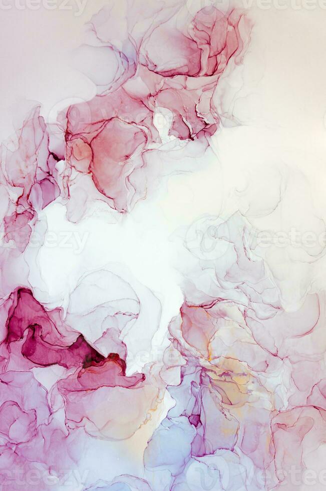 Abstract created using the technique of Alcohol ink. Macro photography of the smallest details of a panting. The panting shows how overflows of shades and colors of paint resemble space motifs. photo