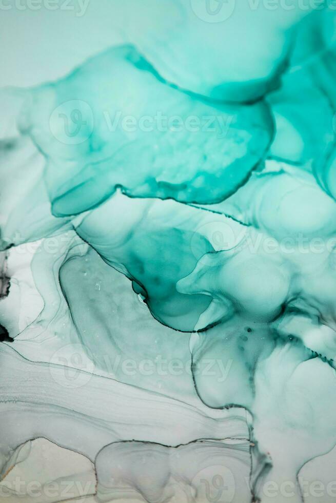 Alcohol ink sea texture. Artistic bright splash. Liquid artwork. Abstract ethereal swirl. Fragment of artwork. Trendy modern art. Inspired by the sky, as well as steam and smoke. photo