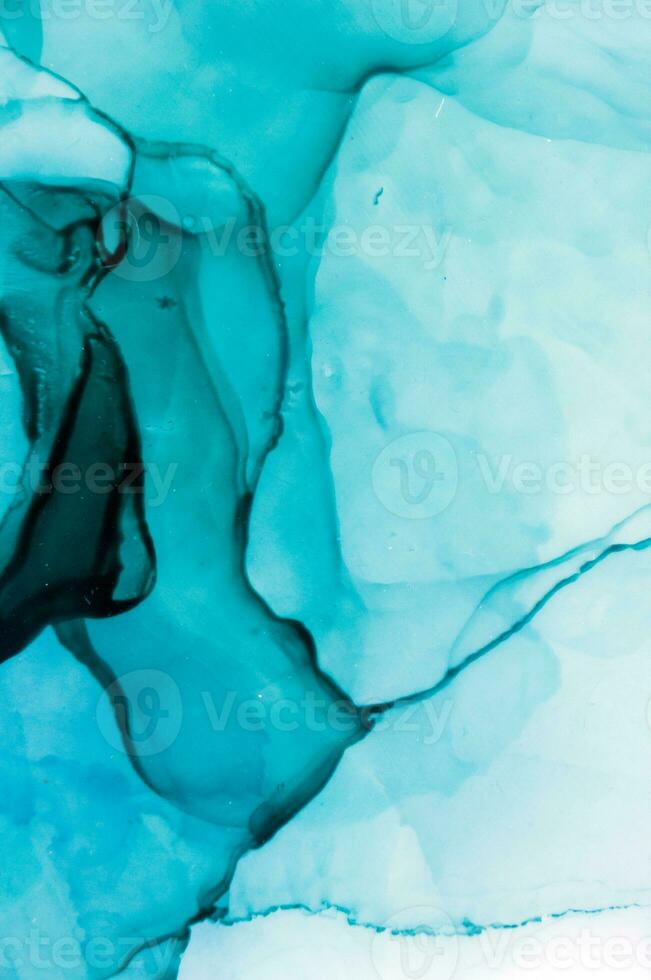 Ink colors are amazingly bright, luminous, translucent, free-flowing, and dry quickly. Abstract artwork. Trendy wallpaper. Natural pattern, luxury. Art for your design project. Transparent creativity. photo