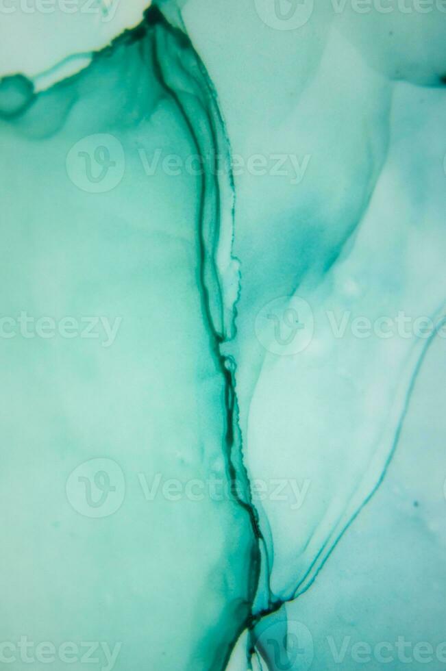 Alcohol ink. Style incorporates the swirls of marble or the ripples of agate. Abstract painting, can be used as a trendy background for wallpapers, posters, cards, invitations, websites. photo