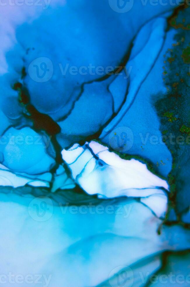 The picture is painted in alcohol ink. Abstraction will perfectly fit into a modern interior. Closeup of the painting. Colorful abstract painting background. photo