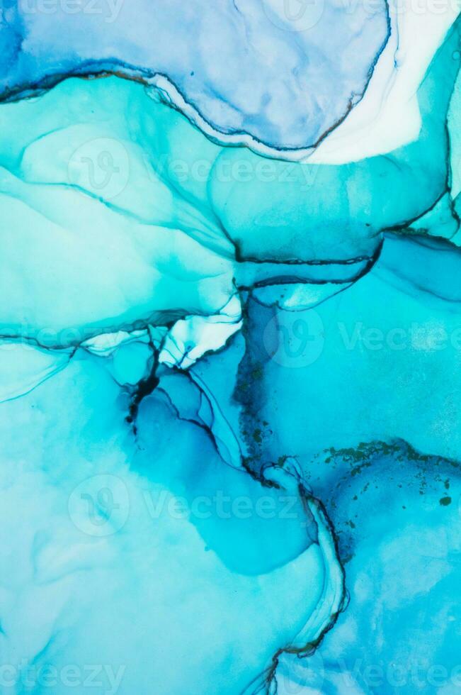 The picture is painted in alcohol ink. Abstraction will perfectly fit into a modern interior. Closeup of the painting. Colorful abstract painting background. photo