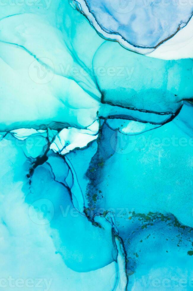 The picture is painted in alcohol ink. Abstraction will perfectly fit into a modern interior. Closeup of the painting. Colorful abstract painting background. photo