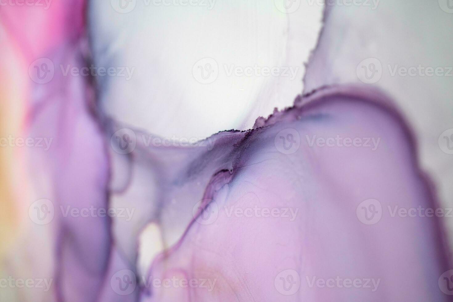 Abstract created using the technique of Alcohol ink. Macro photography of the smallest details of a panting. The panting shows how overflows of shades and colors of paint resemble space motifs. photo