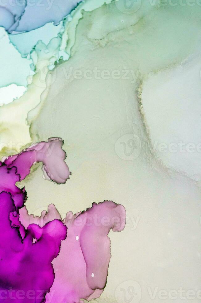 The picture is painted in alcohol ink. Creative abstract artwork made with translucent ink colors. Trendy wallpaper. Abstract painting, can be used as a background for wallpapers, posters, websites. photo