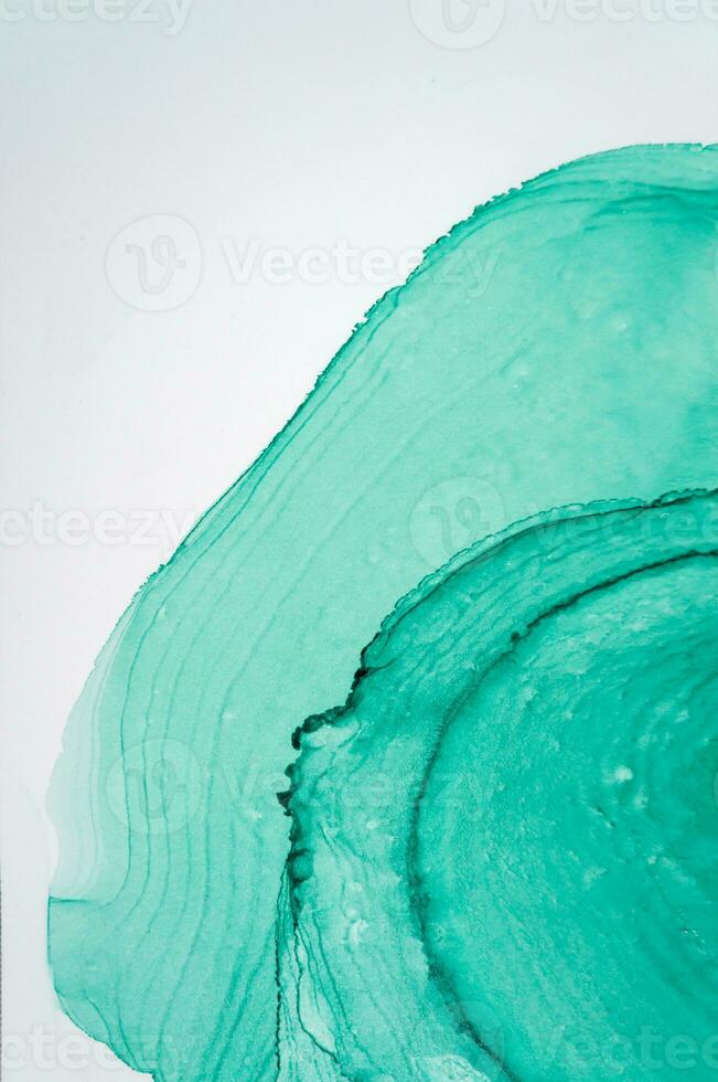 Ink colors are amazingly bright, luminous, translucent, free-flowing, and dry quickly. Abstract artwork. Trendy wallpaper. Natural pattern, luxury. Art for your design project. Transparent creativity. photo