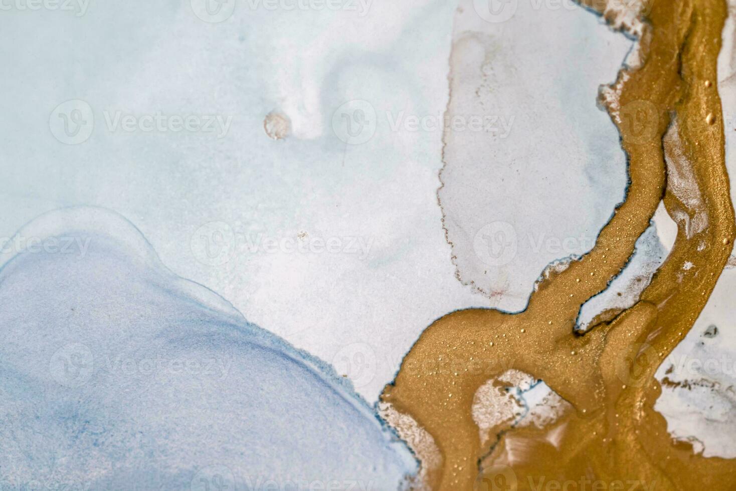 Alcohol ink sea texture. Artistic bright splash. Liquid artwork. Abstract ethereal swirl. Fragment of artwork. Trendy modern art. Inspired by the sky, as well as steam and smoke. photo