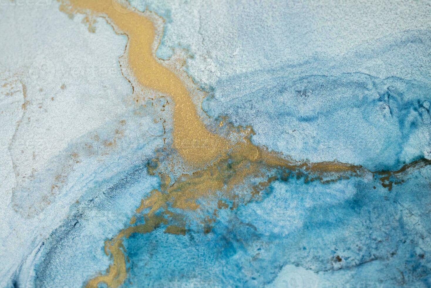 Alcohol ink sea texture. Artistic bright splash. Liquid artwork. Abstract ethereal swirl. Fragment of artwork. Trendy modern art. Inspired by the sky, as well as steam and smoke. photo